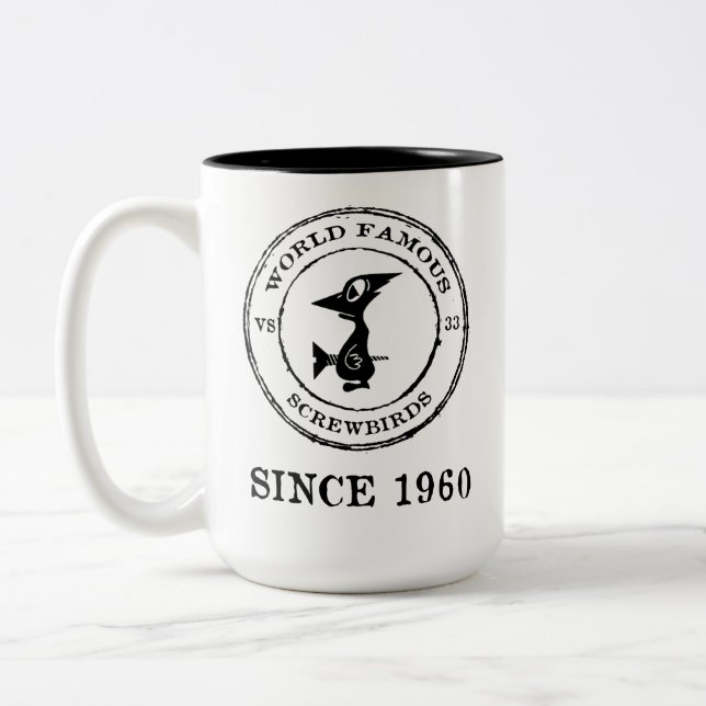 WELTBERÜHMTE BIRDS SEIT 1960 ZWEIFARBIGE TASSE (Links)