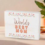 Weltbeste Mama Blume Blumenmüttertag Holzkisten Schild<br><div class="desc">Niedliche Blumenwelt Blume der besten Mama Blumenmutter Tag Holzschachtel Zeichen. Handgezeichnet Blume in schönen Frühlingsfarben. Geschenk für eine Mutter für Muttertag,  Geburtstag oder Weihnachten. Du kannst Mama zu Mama wechseln,  Mama, ..</div>
