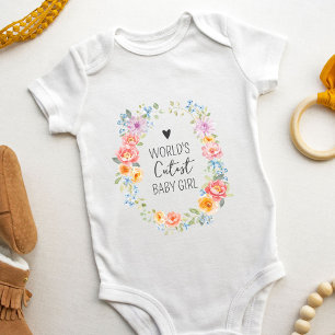 Weltweit süßestes Baby-Mädchen-Zitat Buntes Floral Baby Strampler