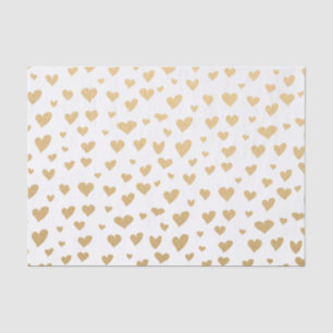 Wenig Goldherzen auf Schneewittchen-Hintergrund Seidenpapier