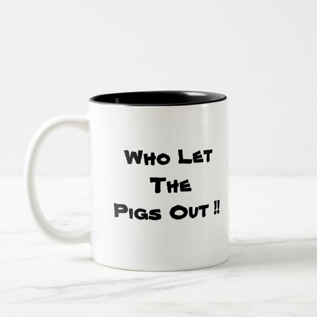 Wer ThePigs heraus! ließ! Zweifarbige Tasse (Links)