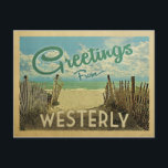Westerly Beach Vintage Travel Postkarte<br><div class="desc">Dieses Greetings From Western Vintage Postcard Design verfügt über einen Sandstrand mit einem schönen türkisfarbenen Ozean Wasser und über dem Meer,  einen blauen Himmel mit billigen weißen Wolken. Im Vintage Reisen Stil.</div>