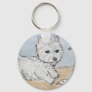 WESTIE, DAS AUF STRAND SPIELT SCHLÜSSELANHÄNGER