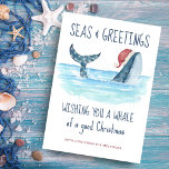 Whale Weihnachtssee & Grüße Weihnachten<br><div class="desc">Die Weihnachtskarte des Nautical Spaß ist mit einem Aquarellwal ausgestattet,  der eine Weihnachtsmannmütze trägt,  die im Meer schwimmt und dessen Schwanz mit Streichlichtern geschmückt ist. Die Grüße "Seas & Greetings" und "Einen Wal von einem guten Weihnachtsfest wünschen",  zusammen mit dem Namen können personalisiert sein. Kunst von KL Stock</div>
