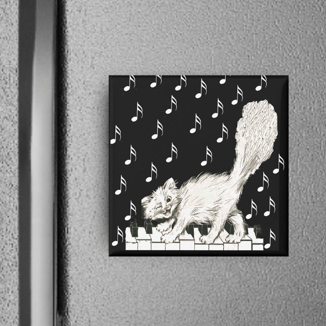 Whie Cat on Piano Keys Magnet (Winking white cat walking on piano keys with music notes on black square magnet.)