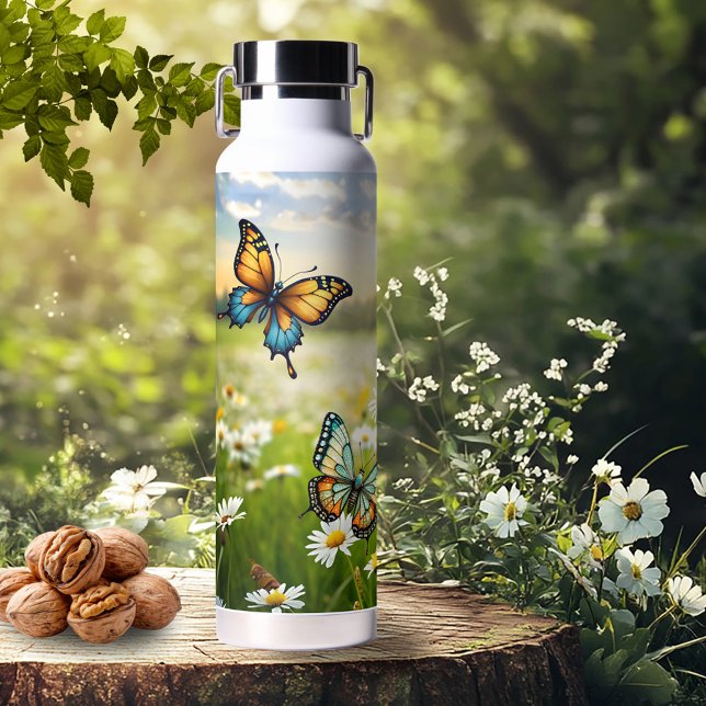 Whimsical Blue Orange Butterflies in Daisy Meadow Trinkflasche (Water bottle featuring colorful artistic butterflies on a meadow with daisies on a sunny spring day)