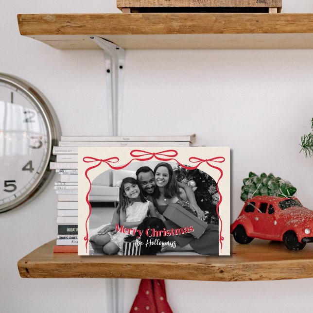 Whimsical Bow Family Foto Weihnachten (Send warm holiday wishes with a touch of charm using this whimsical red bow Christmas photo card.)