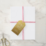 Whimsical Christmas Calligraphy Elegant Swirl Gold Geschenkanhänger<br><div class="desc">Feierliche Weihnachtsgeschenke mit der Kalligrafie "Frohe Weihnachten",  personalisieren Sie mit Ihrem Namen und Jahr oder nach Ihren Wünschen. Weißes Set vor einem Imitat mit goldenem Hintergrund. Einfach,  unterhaltsam und skurril,  elegant und trendig - ideal,  um Ferien zu verbringen.</div>