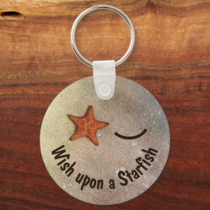 Whimsisches Lächeln und Wink Starfish Beach Schlüsselanhänger