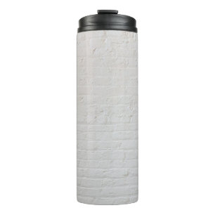 White brick wall thermosbecher