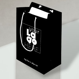 White-Business-Logo auf der Black Paper-Einkaufspa Mittlere Geschenktüte