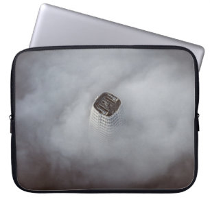 WHITE CONCRETE BUILDING SURROUNDED BY CLOUDS LAPTOPSCHUTZHÜLLE