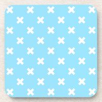 White cross stitches on baby blue