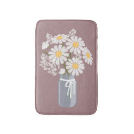 White Daisies Mason Jar auf dunkelrosa Badematte