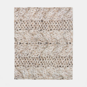 White knitting wool texture background. fleecedecke