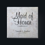 White Peonies & Hearts Wedding Maid of Honor Name Button<br><div class="desc">This beautiful name tag button is perfekt for identifying key members of the wedding party at the bridal shower, rehearsal dinner, or wedding rezeptor. It feys modern black script lettering over a background of reflecting white peony flowers and hearts. The text is fully customizable and reads: Maid of Honor, with...</div>