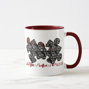 Wie zwei Puzzleteile Tasse