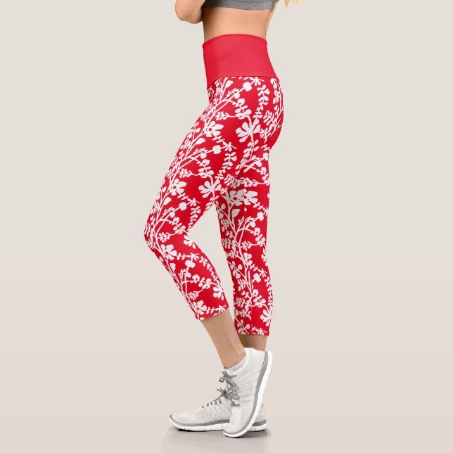 Wiederholtes Muster in Rot und Weiß Capri Leggings (Links)