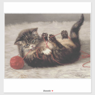 Wiegenlied der Katze, Eine Katze spielt mit einem  Aufkleber