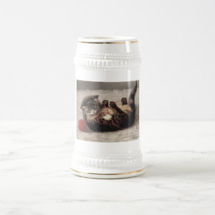 Wiegenlied der Katze, Eine Katze spielt mit einem  Bierglas