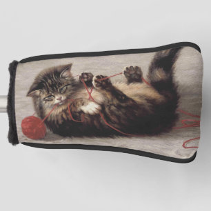 Wiegenlied der Katze, Eine Katze spielt mit einem  Golf Headcover