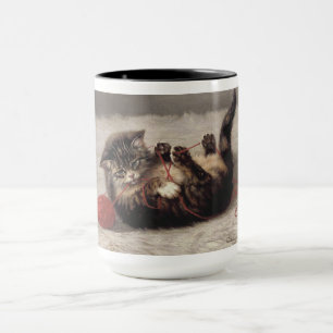 Wiegenlied der Katze, Eine Katze spielt mit einem  Tasse