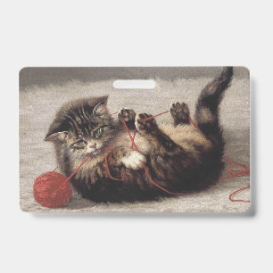 Wiegenlied, Eine Katze spielt mit einem Wollknäuel Ausweis