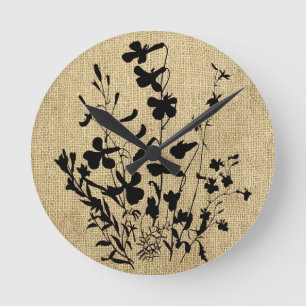 Wildblumen-Silhouette auf Jute Runde Wanduhr
