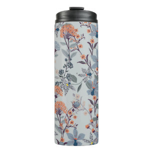 Wilde Blumen auf Blau, botanisches Muster. Thermosbecher