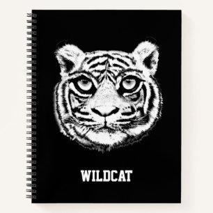 Wilder Tigerkopf auf schwarzem Notizbuch