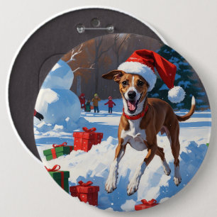 Windhund läuft im Schnee mit Weihnachtsmütze Button