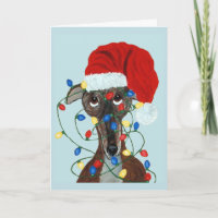 Windhund Santa verheddert in Weihnachtslichtern