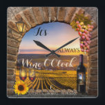 Wine OClock Vineyard Landscape Clock Quadratische Wanduhr<br><div class="desc">It's always Wine O'Clock artistic wall clock featuring a wine bottle, glasses, grapes, lantern and sunflower on Roman arch overlooking a painting of a vineyard landscape. The clock numbers on Member and can be deleted if you do not need them. Für alle Optionen, Choose "customize it" oder "personalize". Beautiful for...</div>