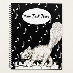 Winking White Cat Wandern auf Piano Keys Musiknote Planer