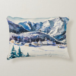 Winterlandschaft mit einem Bergdorf bedeckt mit Dekokissen
