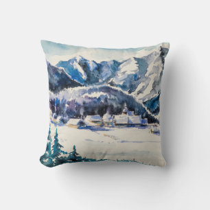 Winterlandschaft mit einem Bergdorf bedeckt mit Kissen