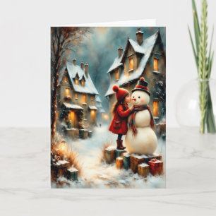 Winterliche Dorfszene mit Mädchen und Schneemann Karte