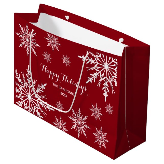 Winterschneeflocken auf Red Happy Holidays Große Geschenktüte (Vorderseite Schrägansicht)