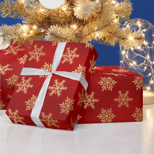 Winterschneeflocken in Rot und Gold Geschenkpapier (Feiertage)