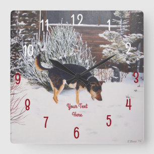 Winterschneeszene mit niedlichem Schwarz-Bein-Hund Quadratische Wanduhr