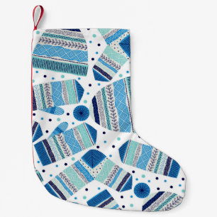 Winterwear: Gemütliches nahtloses Muster. Kleiner Weihnachtsstrumpf