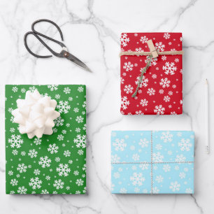 Winterweiße Schneeflocken in grün rot und blau Geschenkpapier Set
