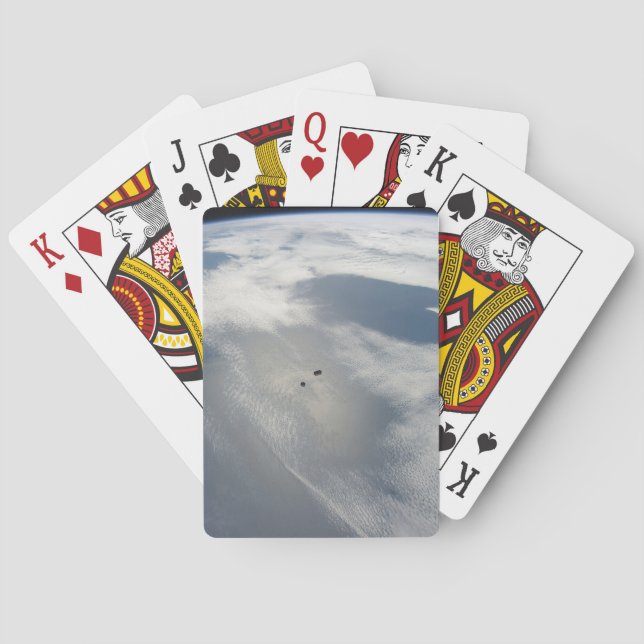 Winzige Satelliten umkreisen über einem Teil der E Spielkarten (Rückseite)