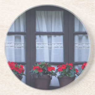 Wohngebäude mit Blume in Fenstern Sandstein Untersetzer