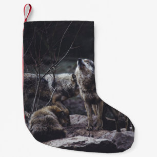 WOLF PACK ON ROCK FORMATION KLEINER WEIHNACHTSSTRUMPF