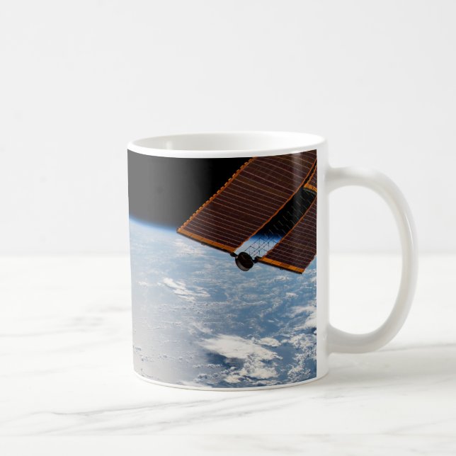 Wolkenformationen rund um den Sonnenuntergang vor  Kaffeetasse (Rechts)