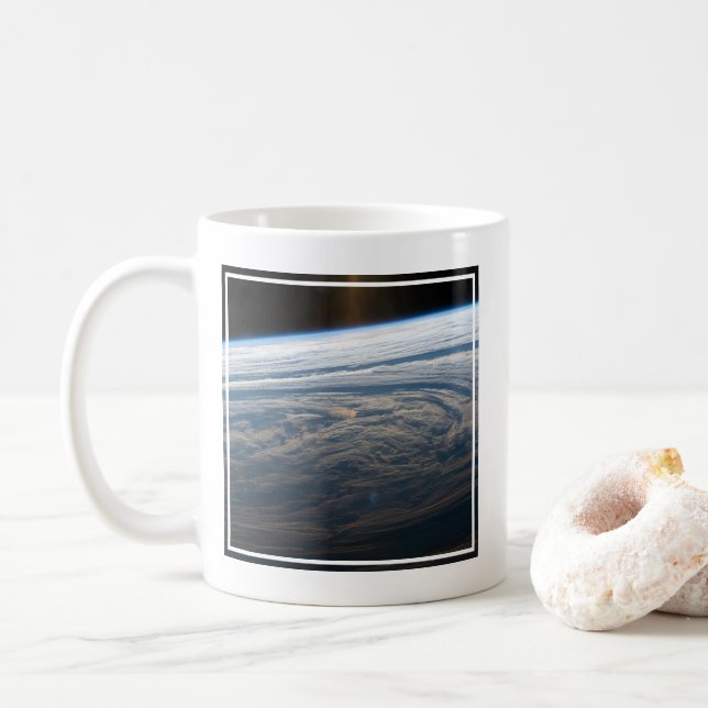Wolkenkratzer im Südindischen Ozean. Kaffeetasse (Mit Donut)