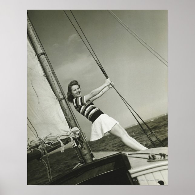 Woman Holding Rigging on Yacht Poster (Vorne)