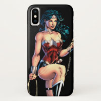 Wonder Woman Gripping Lasso Atop Rock