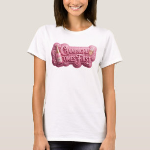 Wunderschönes Rosa CHAMPAGNER KOMMT ZUERST T-Shirt